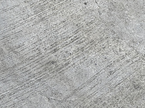 a concrete floor with a rough texture.