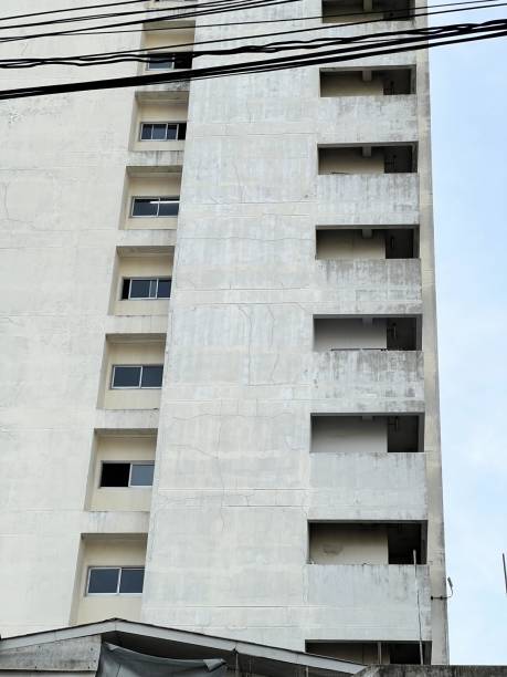 istock a concrete building with a concrete exterior and windows. 1836791913