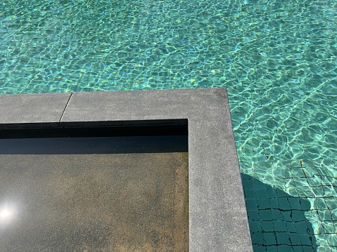 a concrete slab is placed in a pool.
