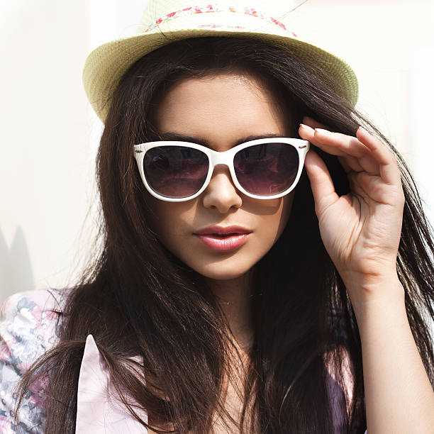 istock woman in bright summer hat 183683664
