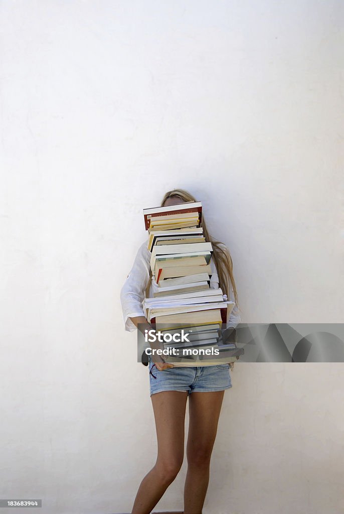 High School Student Holding Lots of Books Book Stock Photo