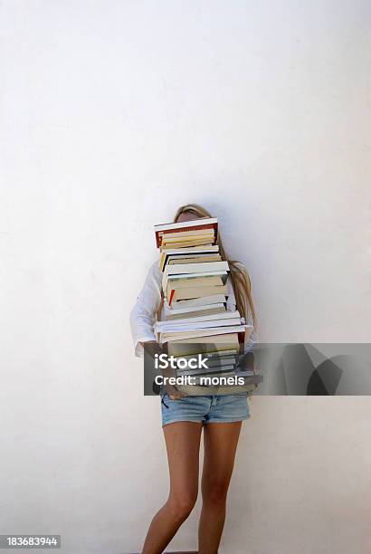 High School Student Holding Lots Of Books Stock Photo - Download Image Now - Book, Stack, Large Group Of Objects