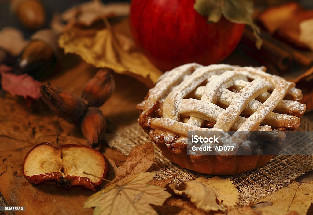 Apple pie Small apple pie in autumnal rustic decor Apple Pie Stock Photo