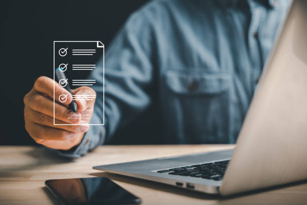 istock Efficient document management Businessman uses pen to sign electronic documents on virtual screen 1836863606