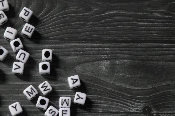 istock alphabet blocks on wooden texture background with negative space 1836874903