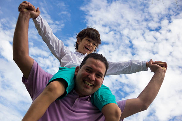istock Happy father having fun with his son 183690812