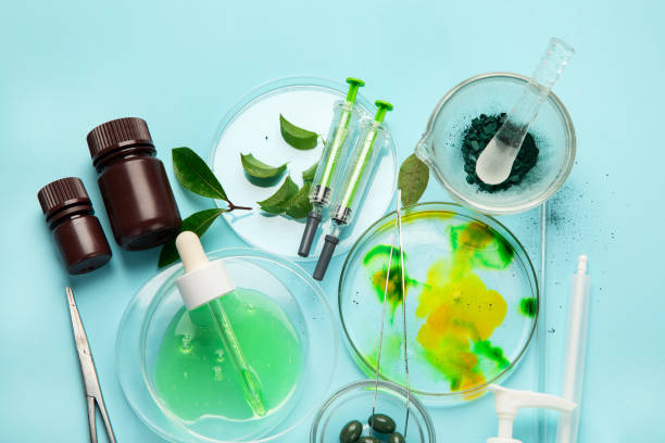 istock Cosmetic laboratory research on blue background. Beauty concept 1836939834