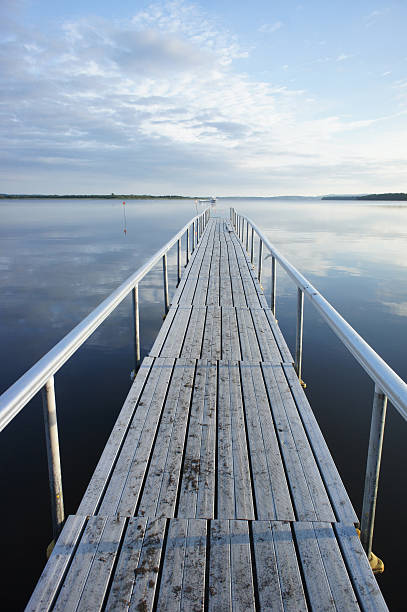istock pier in the early morning 183695049
