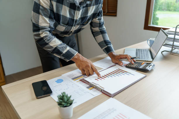 istock Attractive confident Hispanic Business man using laptop computer and professional working investor start up project business planning in office 1836966929