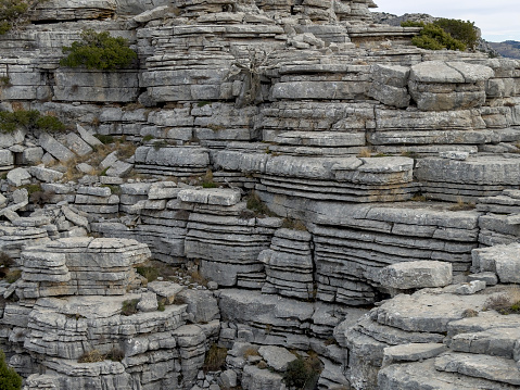 say-shaped texture and layers of limestone cliffs