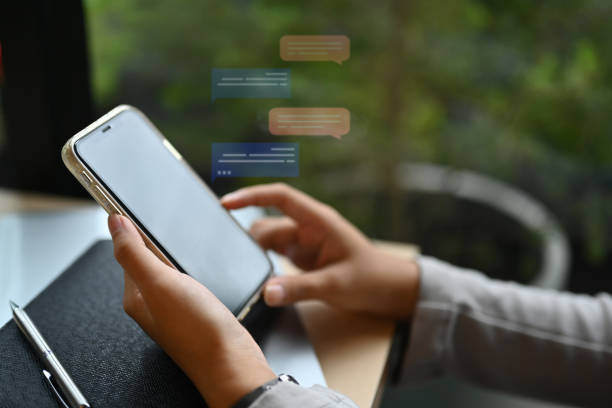 istock Closeup woman using social media, commenting and sharing posts commenting on mobile phone 1836978982