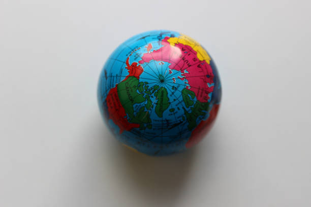istock Top view of the North Pole on a miniature Earth globe on white surface 1836981646