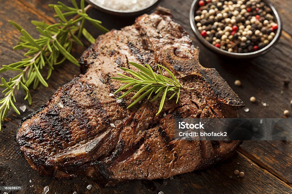 Grilled BBQ T-Bone Steak Grilled BBQ T-Bone Steak with Fresh Rosemary Porterhouse Steak Stock Photo