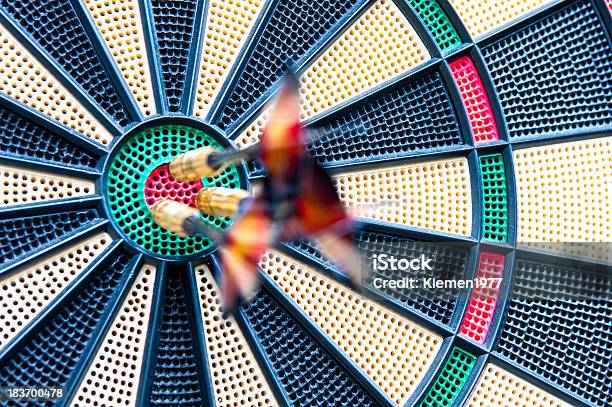 Blurred Darts Stuck In Bullseye Stock Photo - Download Image Now - Sports Target, Accuracy, Achievement