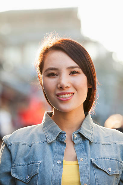 istock Smiling Young Woman In Nanluoguxiang, Beijing 183702486