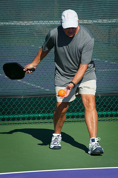 istock Pickleball Action - Beginning the Serve 183702836