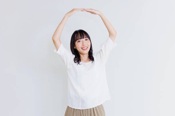 Asian woman with Yes gesture