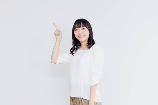istock Asian woman with pointing gesture 1837051914