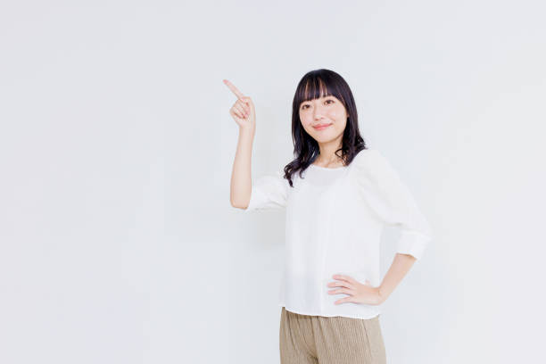 istock Asian woman with pointing gesture 1837051916