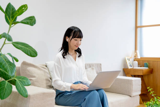 istock Asian woman work from home with a laptop 1837054030
