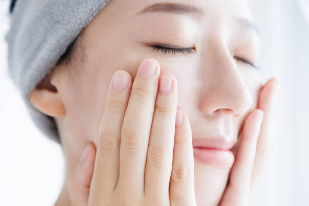 istock Young Asian woman touching her face 1837082810