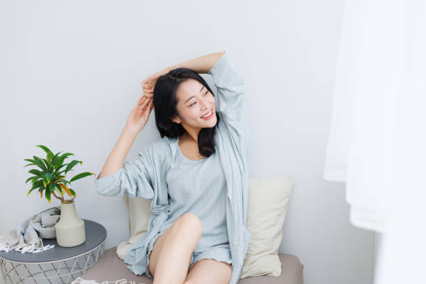 istock Young Asian woman chilling at home 1837087456