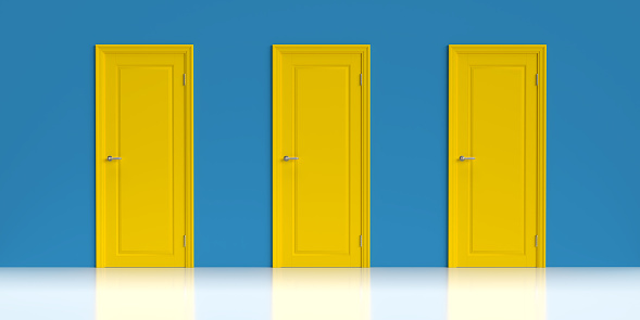 3 yellow closed doors on the blue wall. A concept about new beginnings or choices.