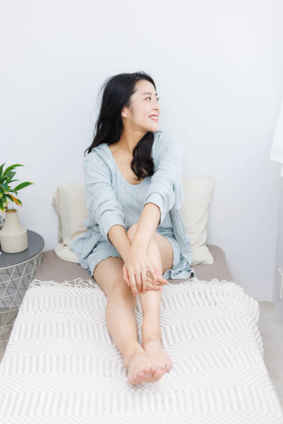 istock Young Asian woman chilling at home 1837087989