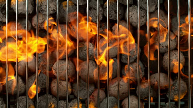 Super Slow Motion Shot of Heating Up the Garden Grill