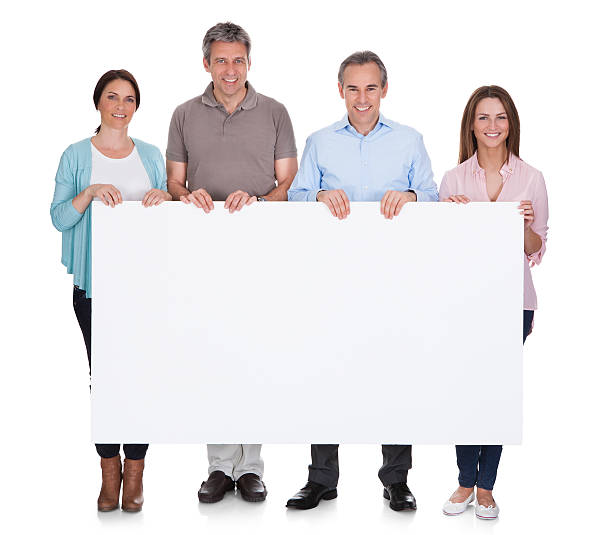 istock Group Of Happy People Holding Placard 183710291