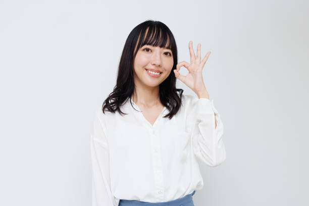 istock Young Asian woman showing Okay gesture 1837113499