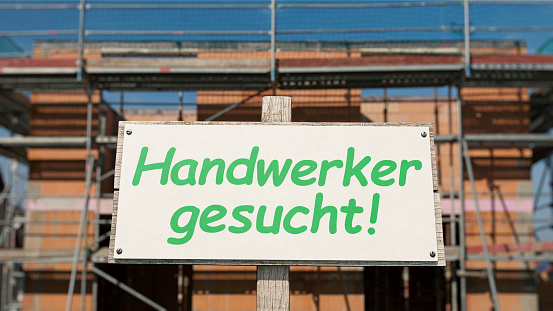 Sign in front of the  shell construction with the German inscription: 