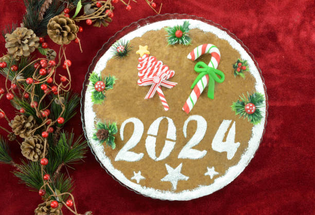 istock 2024 New Year's cake and artificial christmas decorations 1837132207