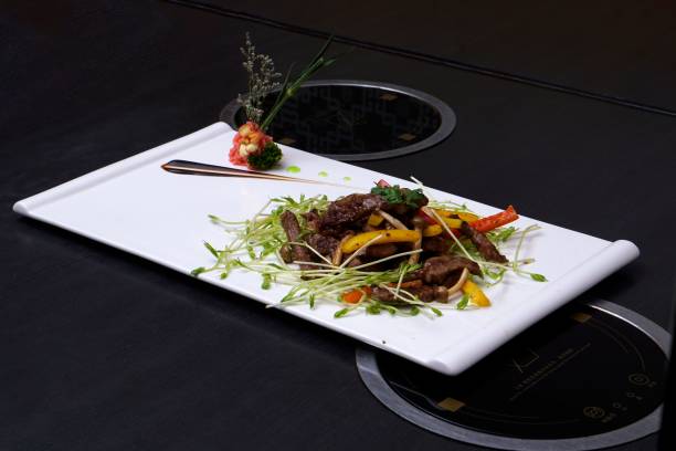 istock Juicy steak served on a white plate with freshly cooked vegetables 1837143695