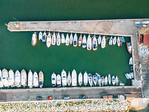 Aerial view of an harbor with moored boats. Castiglione della Pescaia in Tuscany.