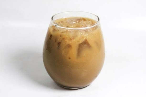 istock iced coffee with ice cubes, isolated on a white background 1837169044
