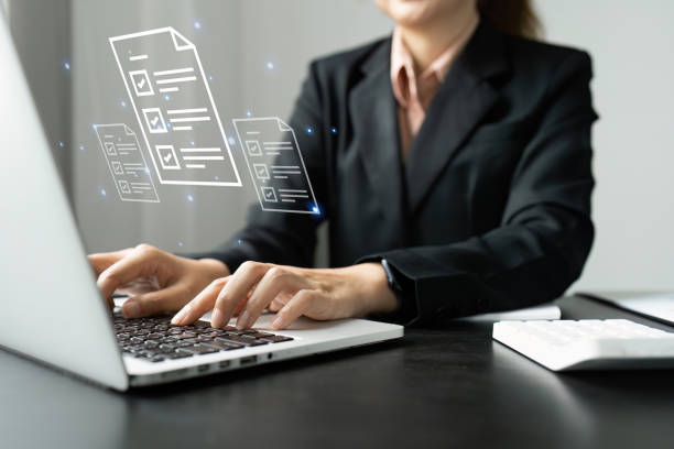 istock Businesswoman working on a laptop computer to document management online documentation database digital file storage system software records keeping database technology file access doc sharing 1837181535