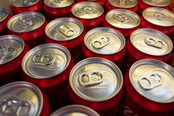 istock Cans of soft drink lined up , 1837195576