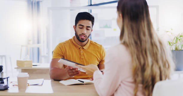 istock Business people, teamwork and paperwork with online management team talking about strategy. Document analysis and man with communication and cooperation planning research with work schedule and idea 1837209606