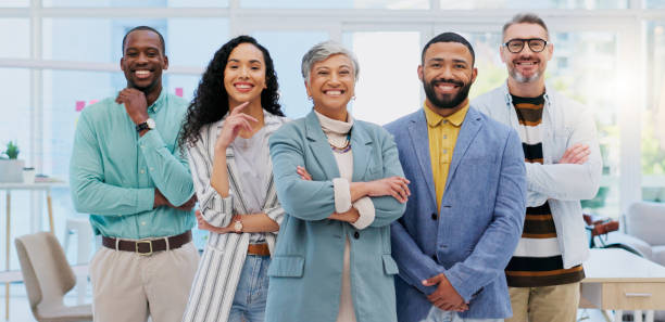 istock Happy creative group, team and confidence in leadership, management or about us at the office. Portrait of confident employee people with smile standing together in teamwork for startup at workplace 1837223280