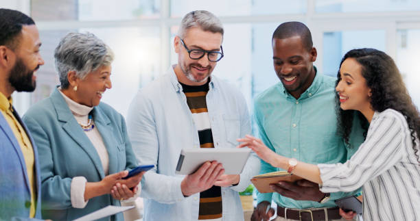 istock Business people, technology and staff brainstorming, planning and conversation with success, internet connection and network. Leader, teamwork or group with coworkers, tablet and cellphone with ideas 1837223785