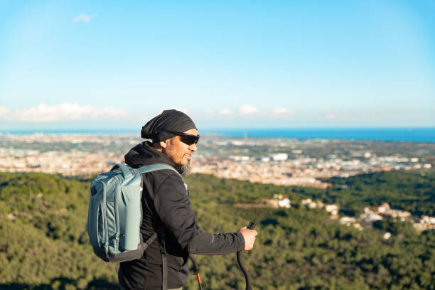 istock Man enjoys the scenery from the mountain. 1837225386