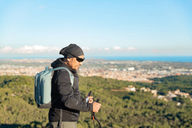 istock Man enjoys the scenery from the mountain. 1837225392