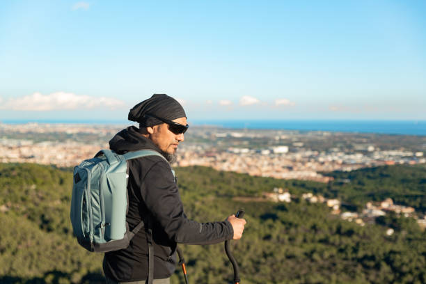 istock Man enjoys the scenery from the mountain. 1837225393