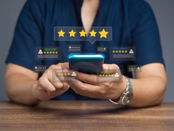 istock Satisfaction and feedback surveys. Customer using a smartphone gives the five-star icon a rating of very impressed for service. 1837228005