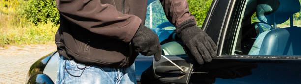 istock Panorama Breaking into a car during the day 1837237626
