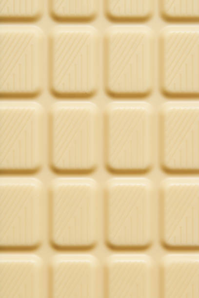 istock White chocolate bar on white marble background. 1837278261