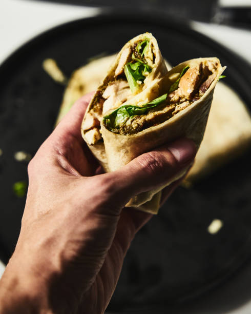 istock Chicken Pesto Wrap with Cheddar cheese and lettuce 1837282018