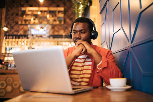 istock young black man in cafe 1837306462
