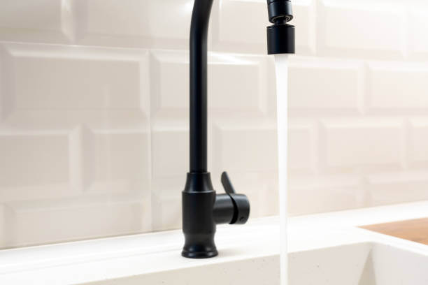 istock Water flowing from a faucet in the kitchen 1837323364